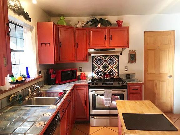 Kitchen with Mosaic above Stove
