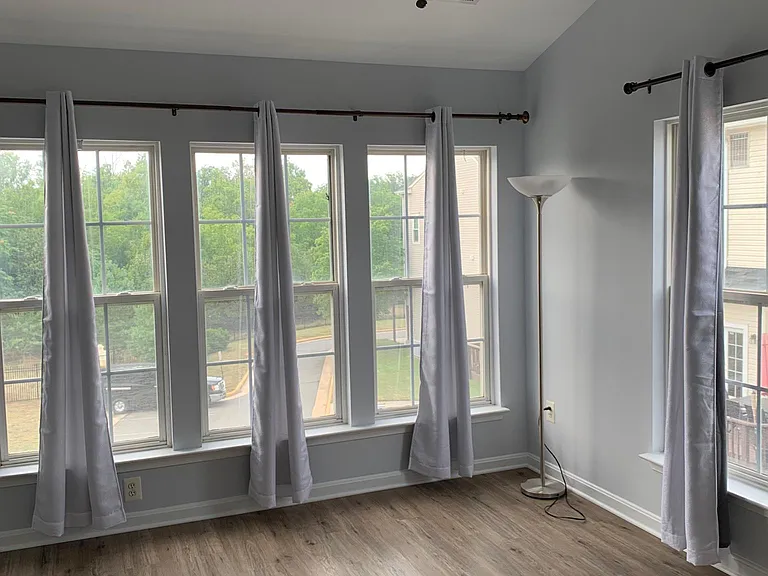 Spacious, vaulted ceiling Master bedroom with ceiling fan