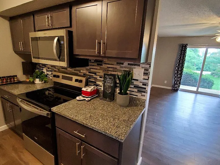 New Kitchen with Electric Stove and Microhood