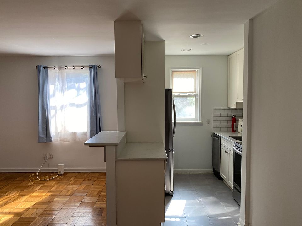 Fully renovated kitchen with stainless steel appliances.