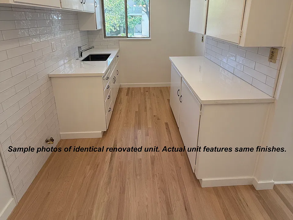 Sample photos of identical renovated unit. Actual unit features same finishes.