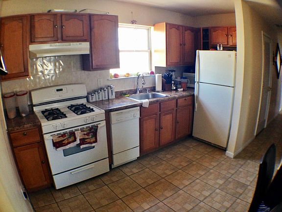 Kitchen with Dishwasher, Stove and Refrigerator