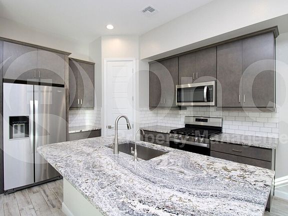 2nd image of 4855 E Village Dr