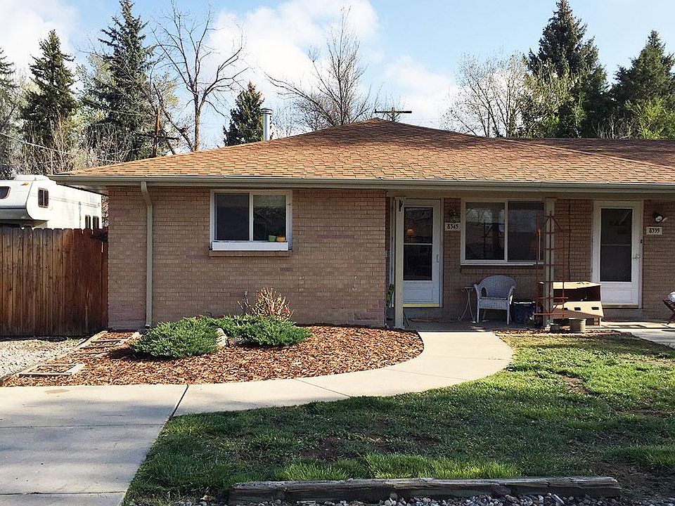 Front of duplex; available unit is on the east side