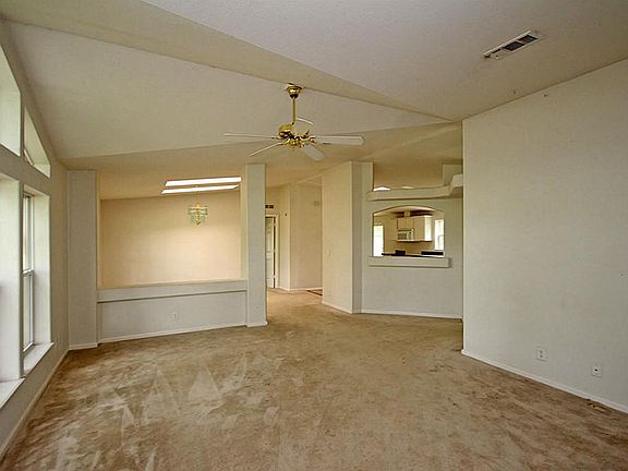 Formal living room off entry is neutral for any decor!