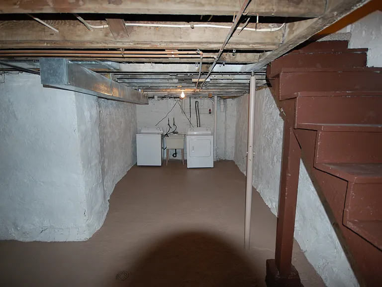 Basement with washer and dryer (no coins)