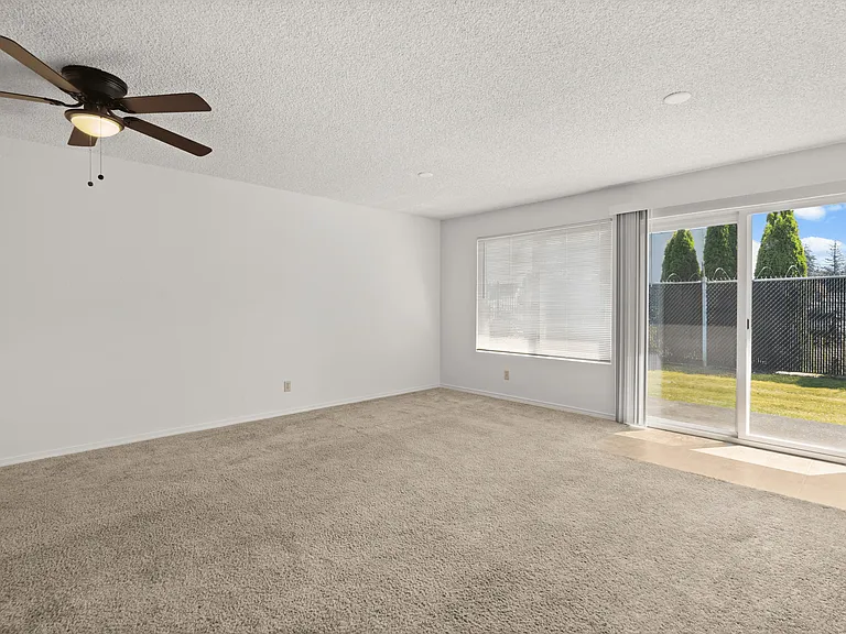Experience the airy comfort of this sunlit living room, perfect for relaxation. Experience the airy comfort of this sunlit living room, perfect for relaxation.