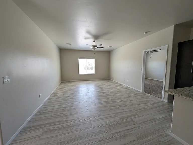 Just 4 years old, this newer home is easy to maintain with tile floors in the open living spaces.