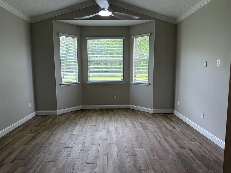 Master bedroom which includes bay window upgrade. (Sorry picture is dark. MUCH lighter in person!)