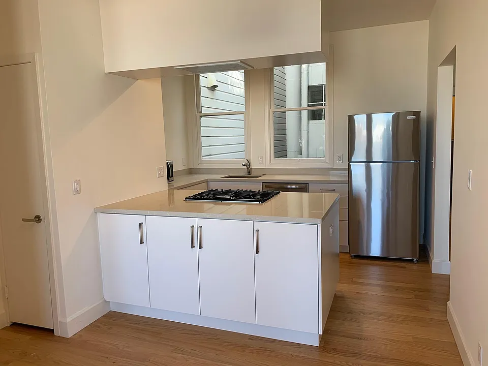 remodeled kitchen and pantry (door pictured at far left)