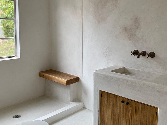 master bath. hand done lime plaster floor to ceiling.