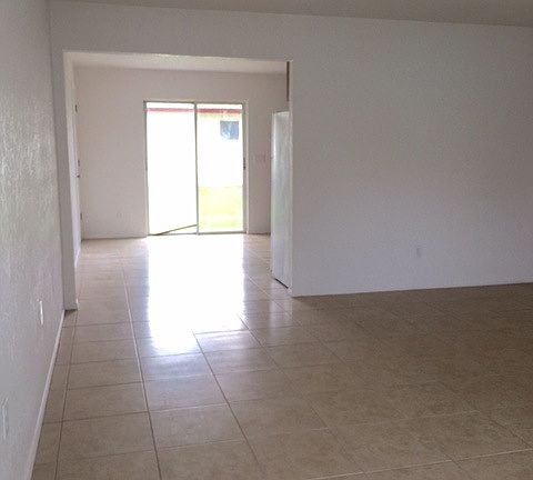 from entry thru the living room and kitchen