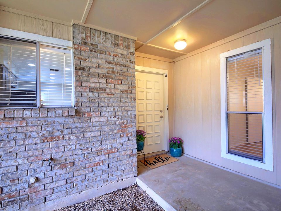 Front door access, there is also a door from the drive at the gate to the backyard and another one to enter the home from inside the garage.