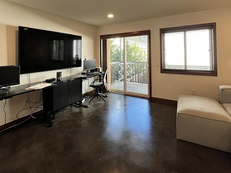 ground floor bedroom with access to patio