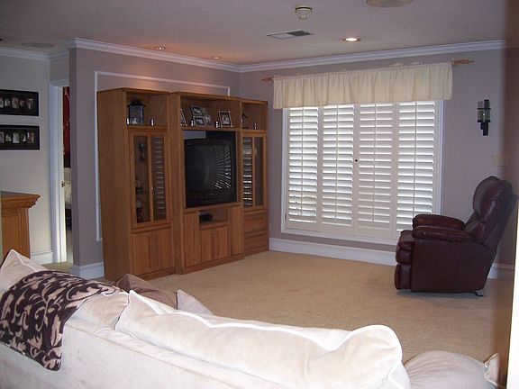 LVNG RM PLANTATION SHUTTER'S THROUGHOUT HOME