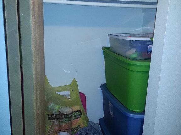 Storage closet in hallway