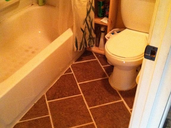 bathroom with tile floors