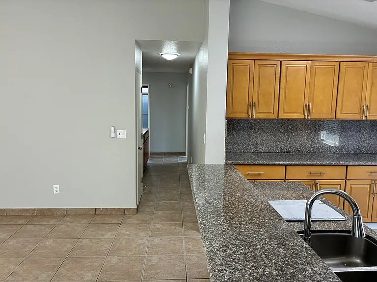 Kitchen looking into bedroom path