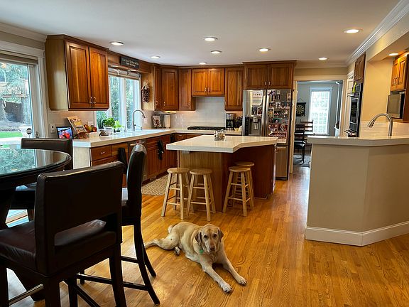 Fully stocked kitchen, you need nothing! 2 ovens, dishwasher, microwave, all cooking utensils, plates/bowls, cups, pots/pans, spices, lots of small kitchen appliances provided. Well trained quiet lab around to pet.