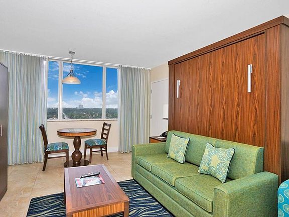 LIVING ROOM WITH QUEEN MURPHY BED and full bath & kitchen