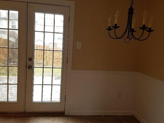 Dining room with doors leading out to back yard