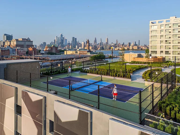 Pickleball anyone? Challenge your friends to a match on our rooftop court