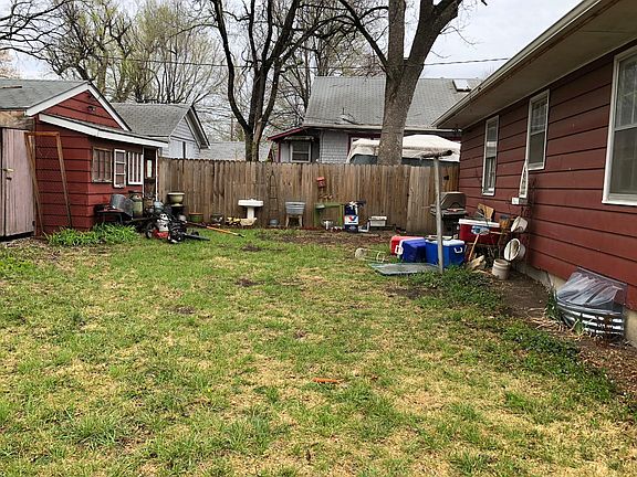 Backyard (nearly completely fenced in) *This house will not 