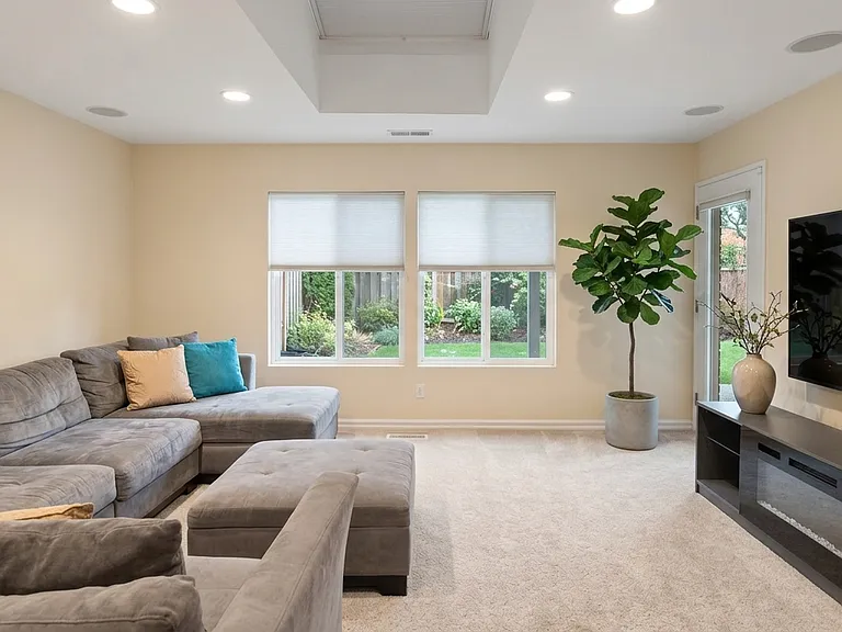 family room with 75 inch screen