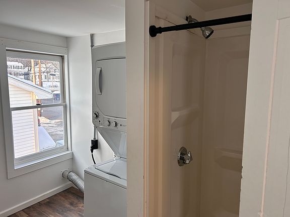 In-unit laundry in bathroom.
