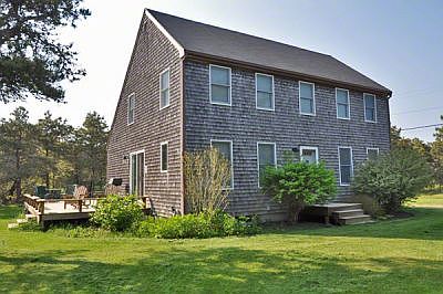 Classic Saltbox Design On Spacious Lot