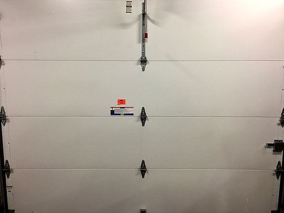 Insulated garage doors back