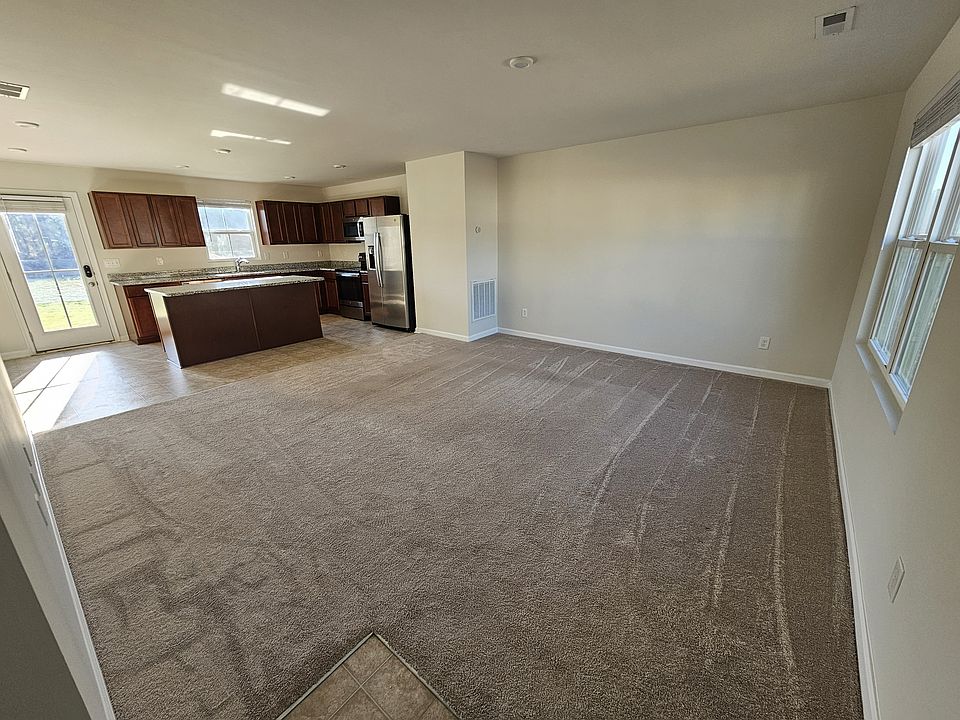 Downstairs Living Area With Pond View