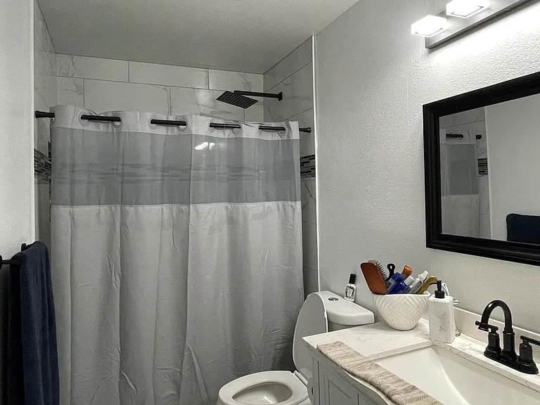 There is bath tub, a shower helps save space in a small unit and saves our precious water for the next generation. Enjoy!