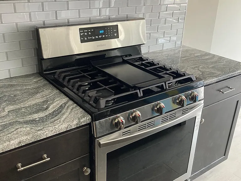 Stainless steel gas range/oven and microwave