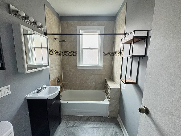 Bathroom, across the hall from third bedrom