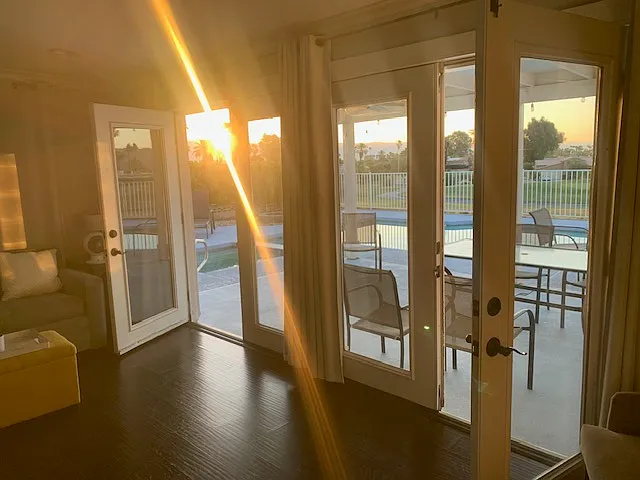 view of bonus room and patio