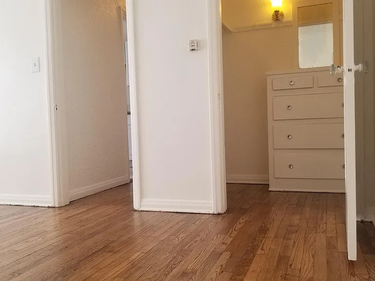 ANOTHER LARGE CLOSET OFF THE LIVING ROOM W/BUILT IN DRESSER