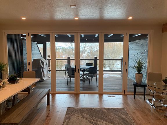 View of deck from dining room and living room.