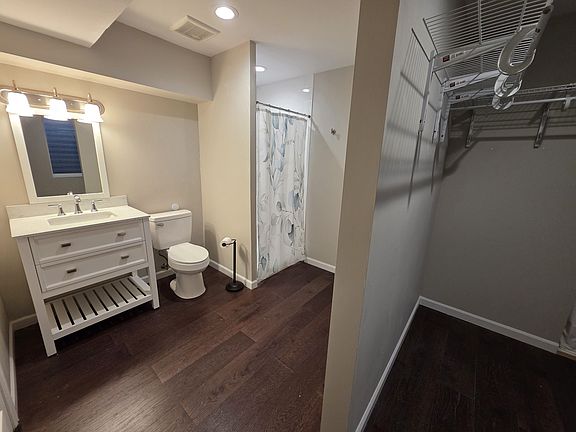 Basement bathroom/closet combo.