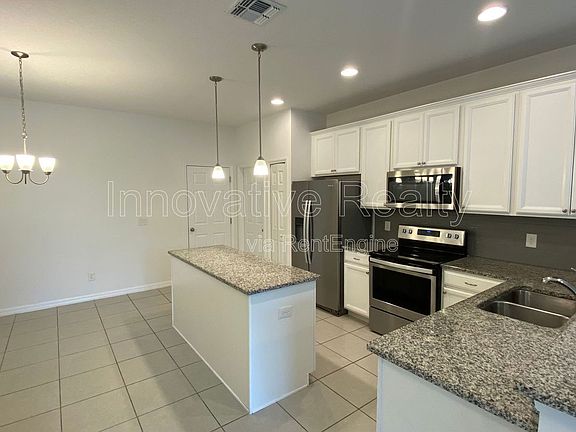 4th image of 6952 Tussilago Way
