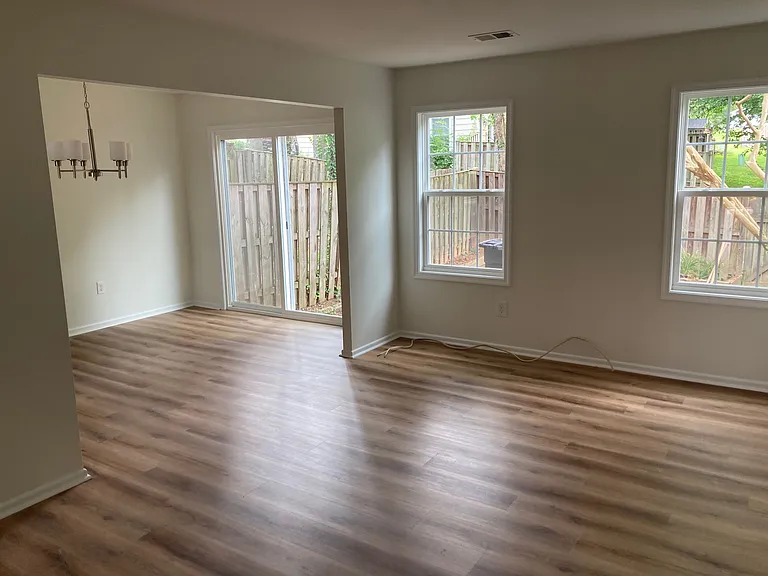 Living Room. New luxury vinyl plank. Fresh paint.