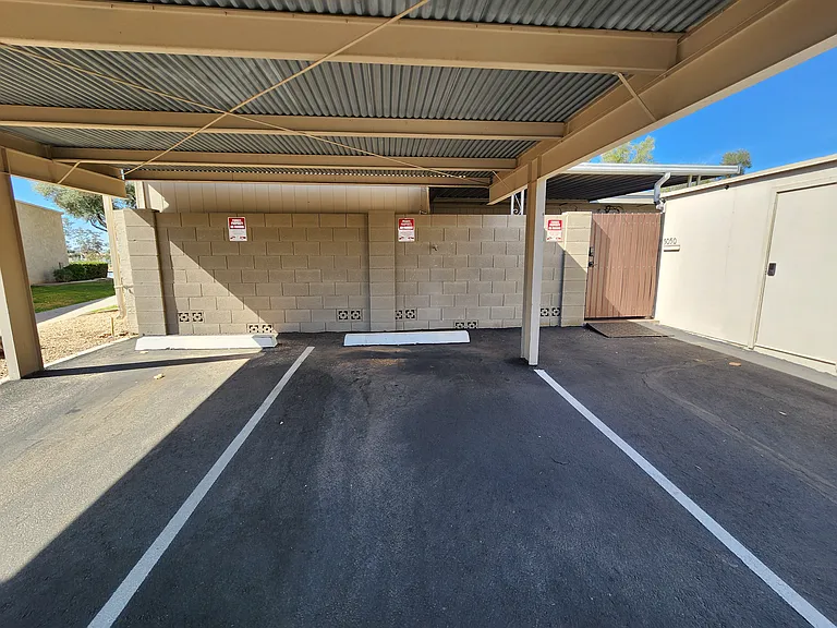 3 reserved and covered parking spaces lead to gated back patio