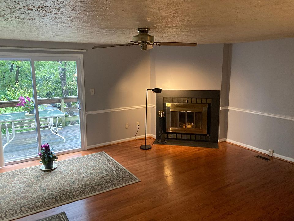 Living Room with view of elevated Deck