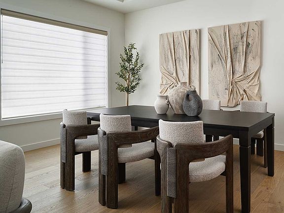 A photo of the dining area of the Lucca estate show home in Calgary by Brookfield Residential