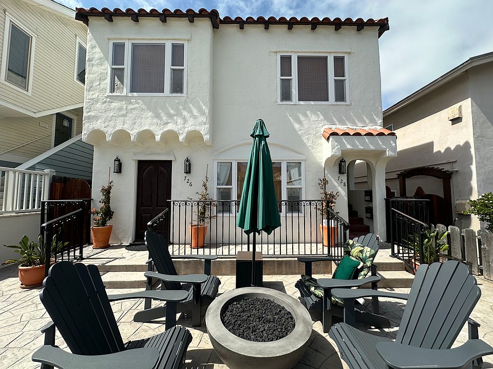 Private patio with firepit on the sunny side of the court
