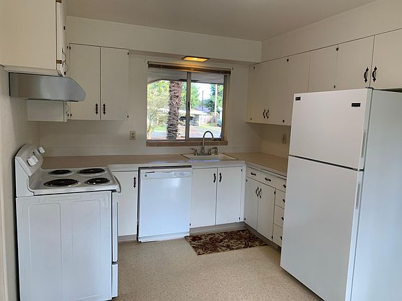 kitchen with newer refrigerator and stove