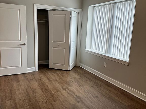 Second bedroom w/ 2 windows and closet
