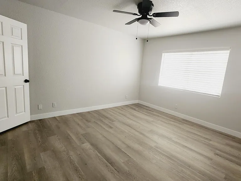 master bedroom with walk in closet