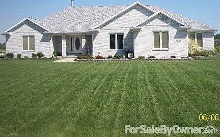 All Brick Ranch
						:
						Pella windows throughout with blinds