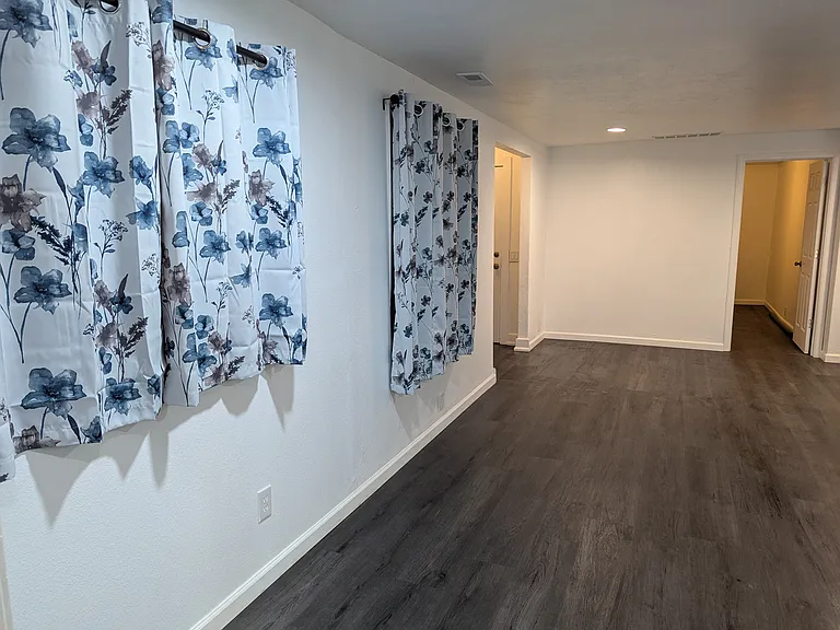 On the way out of the master bedroom to the open living space, with bedrooms on the opposite side, all the interior gathering space right in between.